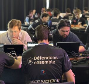 Trois compétiteurs de l'équipe Bouygues Telecom